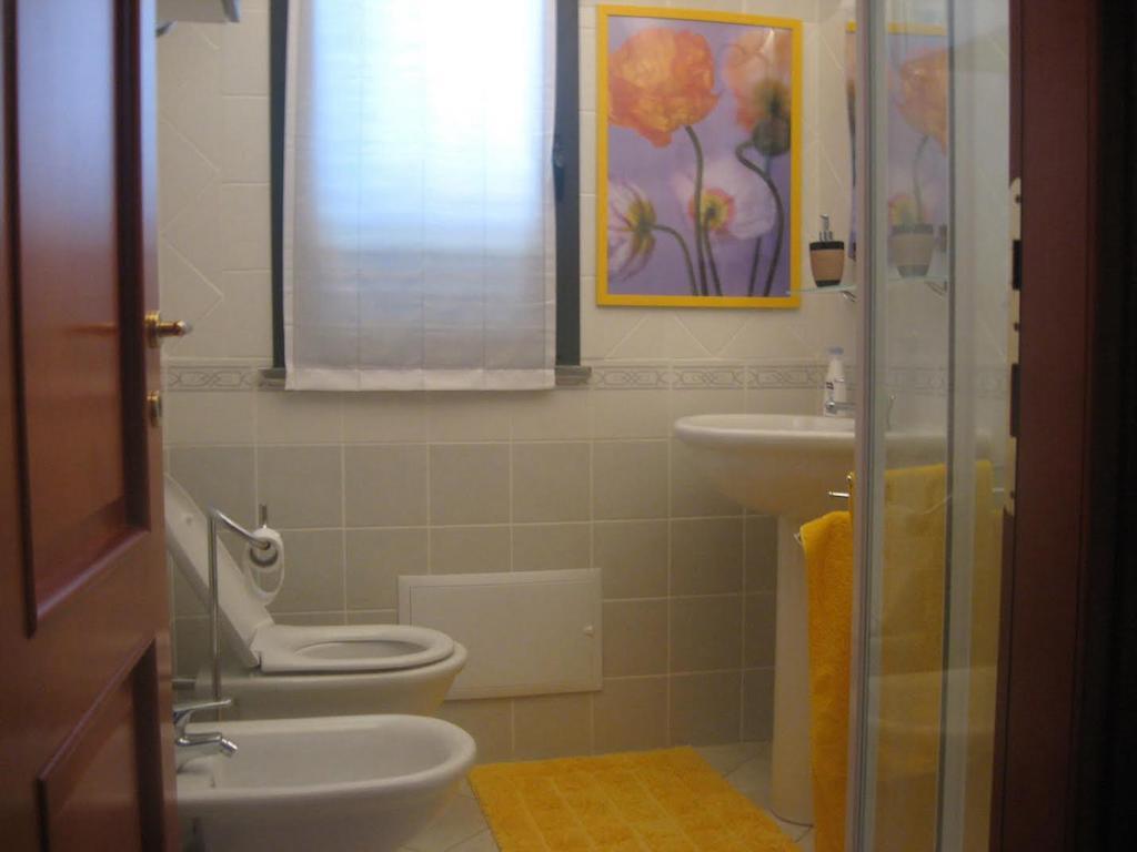 Residenza Piccolo Eden Apartment Боса Марина Стая снимка